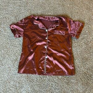 Sleep shirt, buttoned, silky soft to the touch.